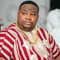 Cubana Chief Priest Mocks Hellen Atti Amid Paternity Dispute
